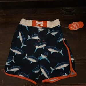 Two T toddler swimming trucks brand new with tags